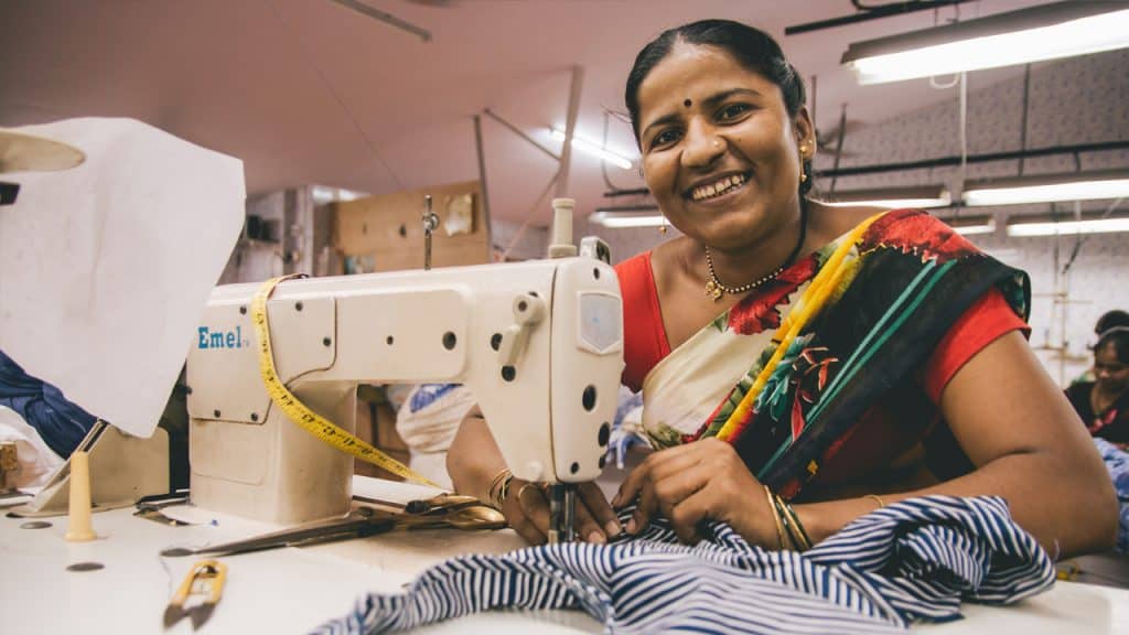 Woman sewing - Creative Handicrafts Coop