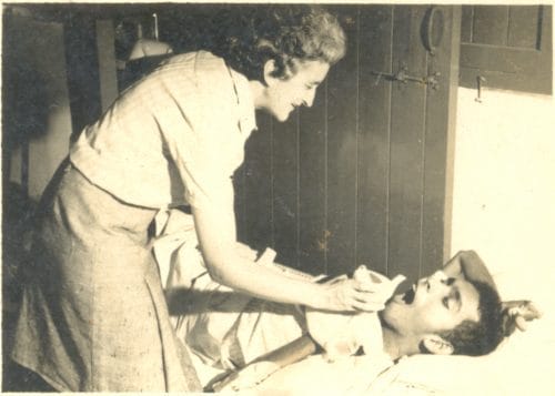 Sister Isabel nursing a patient